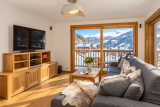 Salon de chalet, vue enneigée Salon de chalet, vue enneigée